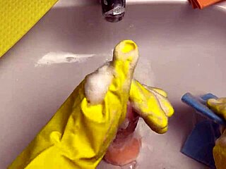 I love watching this hot housewife clean her dildo after play