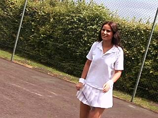 Claudia Rossi intensely masturbates with dildo in tennis uniform.