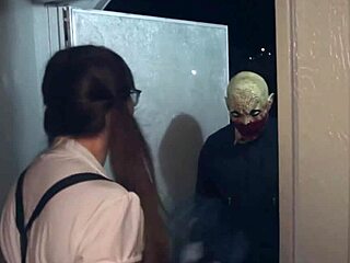 Horny Young Slut Welcomes Monster Cock at Halloween Door