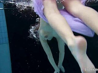 i can’t stop staring at aneta’s big tits in that purple dress underwater in the pool. her petite 18+ body just drives me wild.