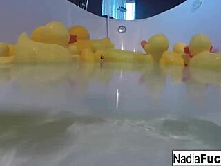 Sexy nadia takes a bath with some rubber duckies