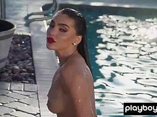 Smoking hot naked brunette babe Emjay Rinaudo is in her element by the pool