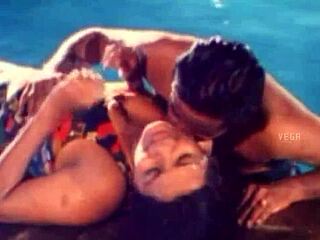 Unmarried hot couple enjoying at the swim pool