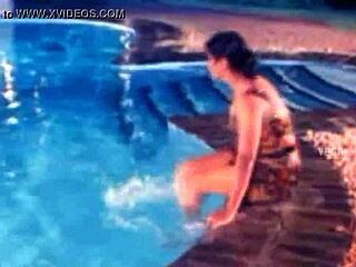 Unmarried hot couple enjoying at the swim pool