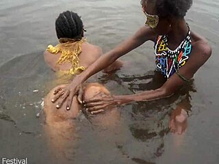 Two lesbians bathe in river!