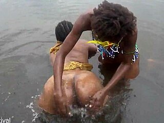 Two lesbians bathe in river!