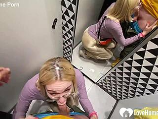 She gives a blowjob in the changing booth on her knees.