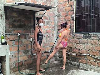 Watch neighbors shower together, spraying water and getting so excited!