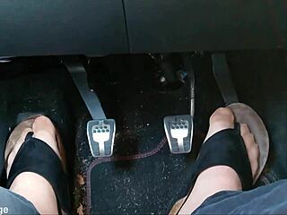 Nylon-clad feet with toe separators tease seductively in the car