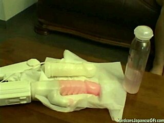 Asian babe toyed in her hairy pussy