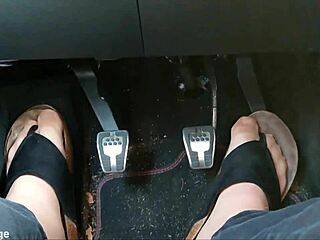 Nylon-clad feet with toe separators tease seductively in the car