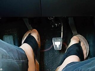 Nylon-clad feet with toe separators tease seductively in the car