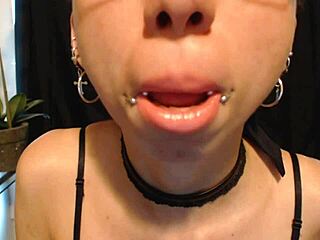 putting on nude colored lipstick and drooling all over it