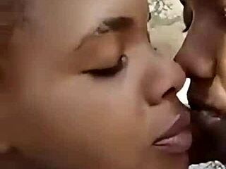 two liberian lesbos making out in an uncompleted building