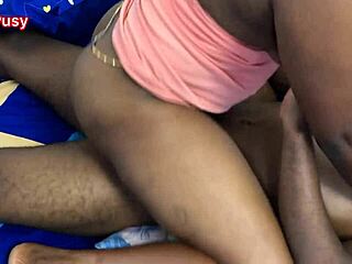 In the cozy home of a married african couple, the black bride and groom share intimate homemade moments of passion and connection.