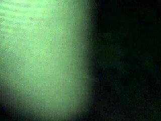 in the wood only with g-string and fishnet stockings