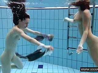 Shaved Brunette with Big Tits Bathes Underwater in Pool