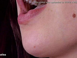 karly, the cute domme, dominates with mouth tests, sucking and kissing during bdsm massage