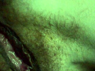 Hey, check out me playing with my wet pussy in the low light, spreading it wide for you 😏