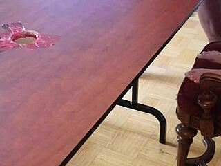 she stomps cum out of his huge cock on the desk