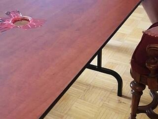 she stomps cum out of his huge cock on the desk