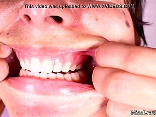 Gagged mouth fetish in closeup view