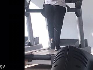Big booty girl works out on the treadmill