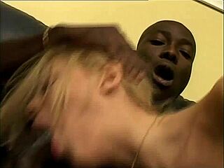 In red stockings, she gives a good fuck and a tempting footjob to the black cock.