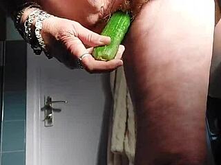 German granny intensely fucks pussy with cucumber