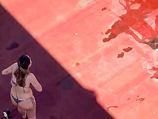 Argentinian neighbors sunbathe in bikinis on terrace part 4