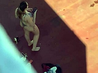 Argentinian neighbors sunbathe in bikinis on terrace part 4