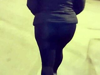 mature curvy exhibitionist flashes huge ass in see-through leggings on public street taboo tease