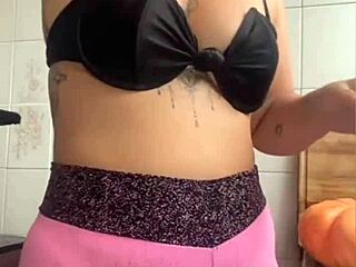 making dinner for hubby's friend knowing i'll be their halloween dessert in the kitchen 👻🍑