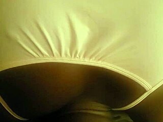 ebony girl kneels by bed sucking big black monster cock eagerly