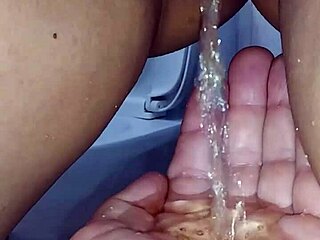 Homemade asian couple explores watersports in private setting