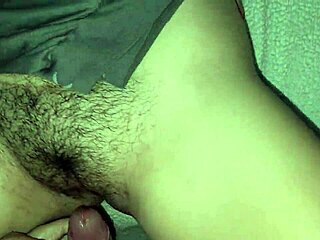 Chubby Latina moans with tight hairy pussy under sheets in taboo play.