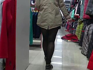 a hidden cam catches juicy pawg legs in nylons at mall fitting room voyeur peek