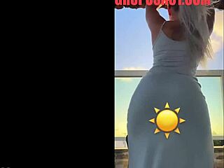 hot blonde dances seductively in sheer see-through dress
