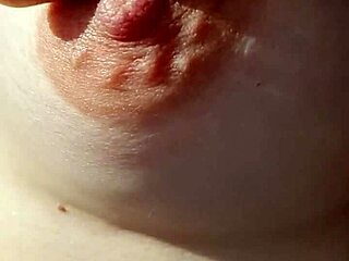 perky nipples poke through thin fabric on braless babe