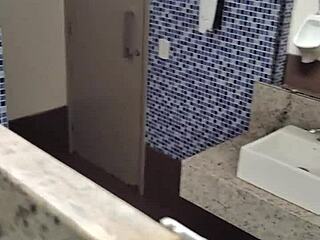 What lurks inside this public bathroom toilet stall? Solo amateur strokes small cock outdoors.