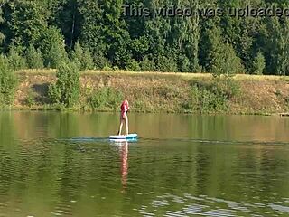 Sup Model Flaunts Pink Micro Bikini on Beach and Garden