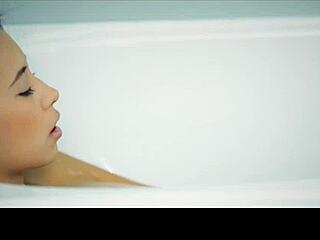 whoa czech babe's huge natural tits glisten as she fingers pussy deep in steamy bath