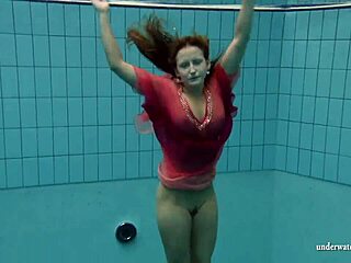 Oh man big tits silvie swims underwater showing off that hairy russian beaver poolside