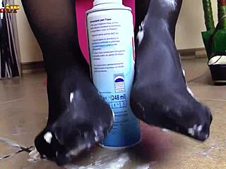 oh man this brunette in pantyhose n nylons is givin me the messiest footjob ever