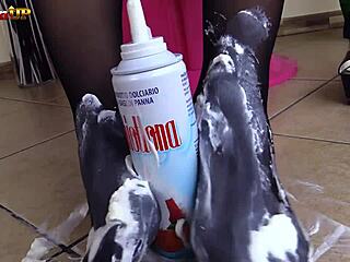 oh man this brunette in pantyhose n nylons is givin me the messiest footjob ever