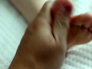 Stepmom seduces stepson with foot massage leading to intense fucking.