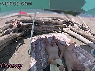 exhibitionist wife milks huge cock handjob on nude beach cumshot!