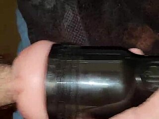 guy grabs fleshlight for monster cock stroke session with big cumshot finish
