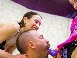 TWO DOMINAS MAKE SLAVE LICK BOOTS SPANK AND STRAPON FUCK!!