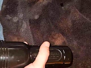 guy grabs fleshlight for monster cock stroke session with big cumshot finish